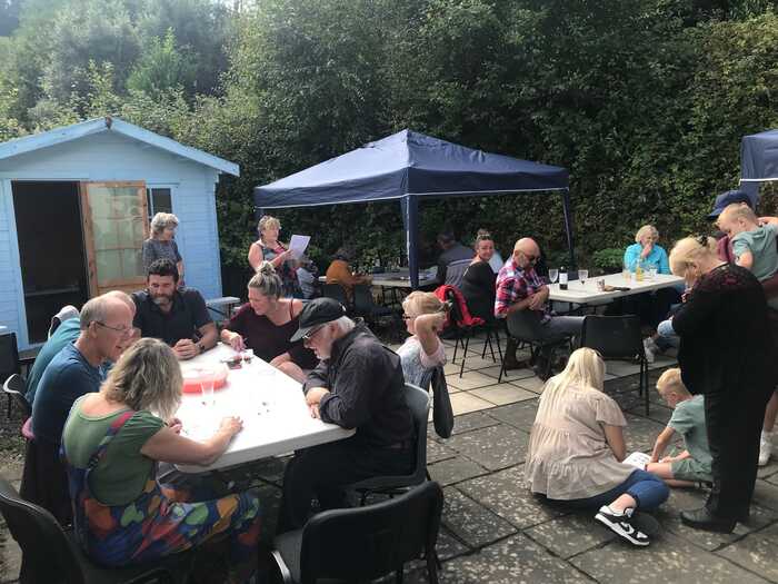 Michelle announcing the winners of the quiz.